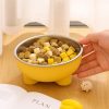 Comedero-para-perro-amarillo-de-acero-inoxidable-mano