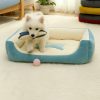 cama-turquesa-para-perro-huesos-pelota
